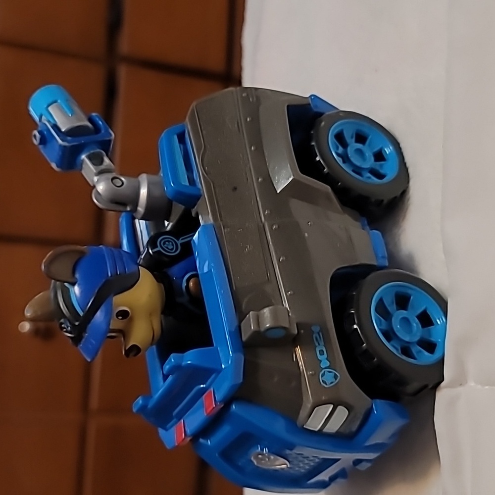 PAW Patrol Vehicle - CHASE - Rescue Patrol Cruiser with Chase Figure sitting
